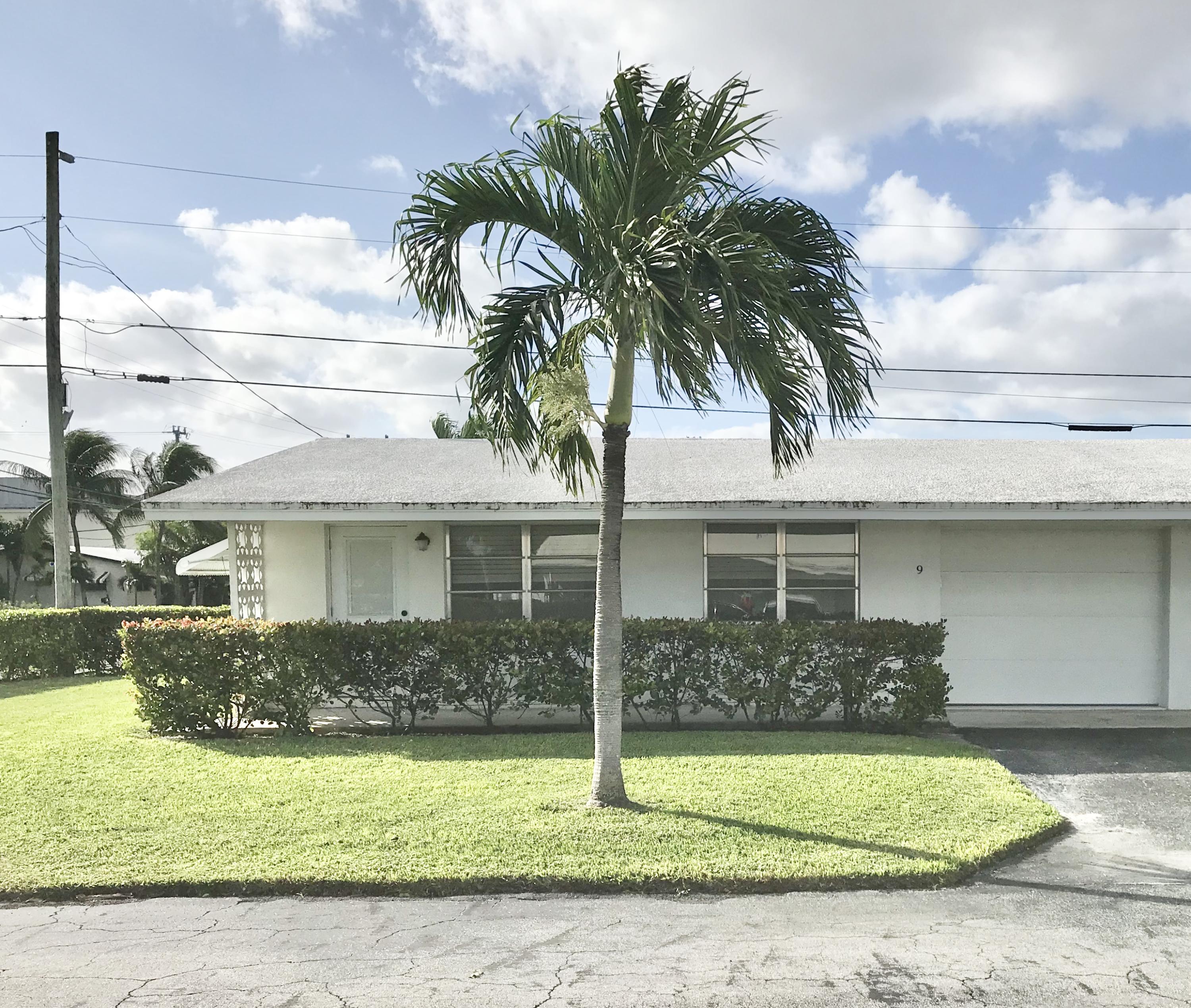 721 Ridge Road, Unit 9 Lantana, FL 33462 - Photo 1 of 30 END UNIT WITH GARAGE IN LANTANA