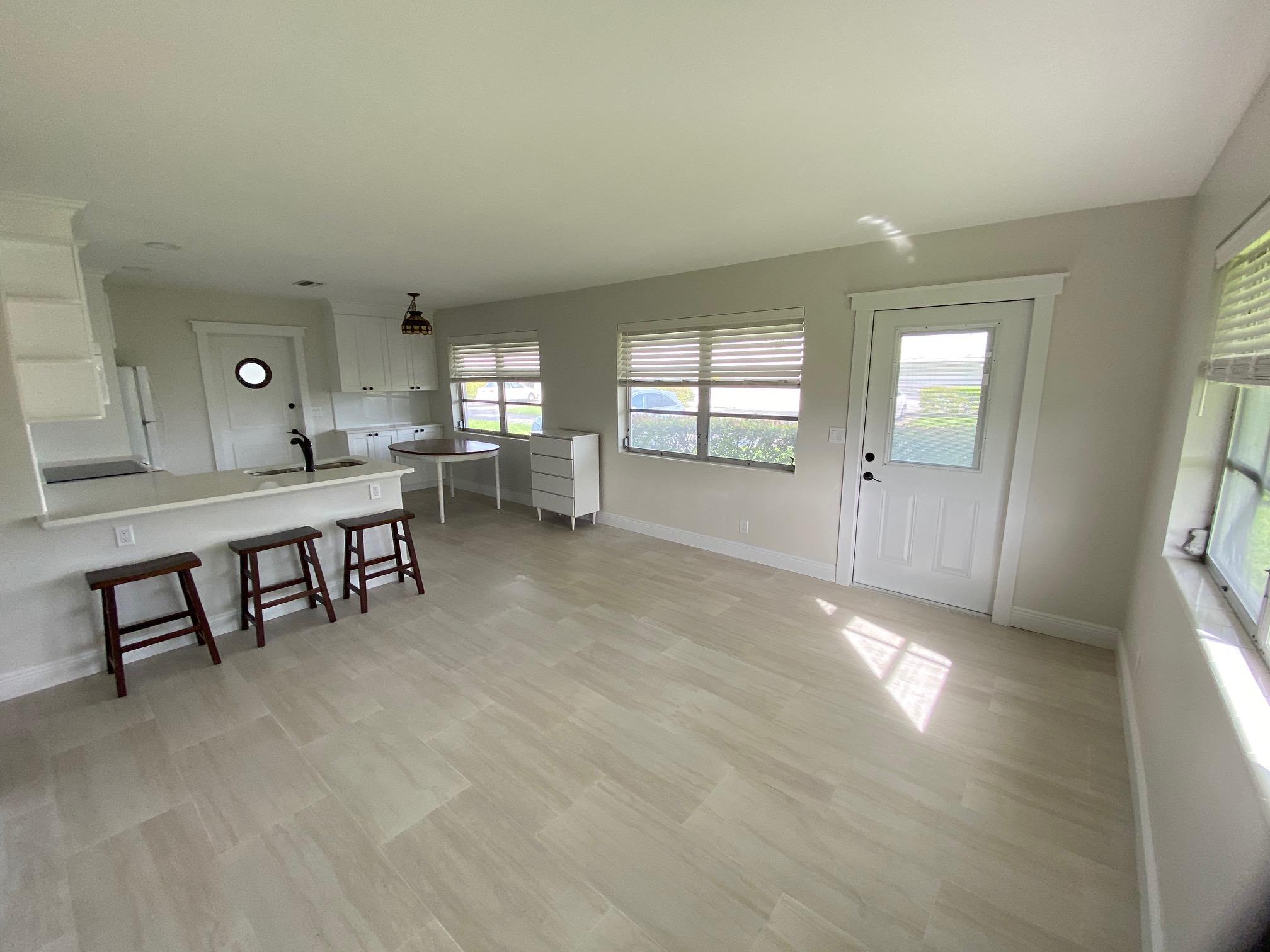 721 Ridge Road, Unit 9 Lantana, FL 33462 - Photo 9 of 30 OPEN LIVING/ DINING/KITCHEN