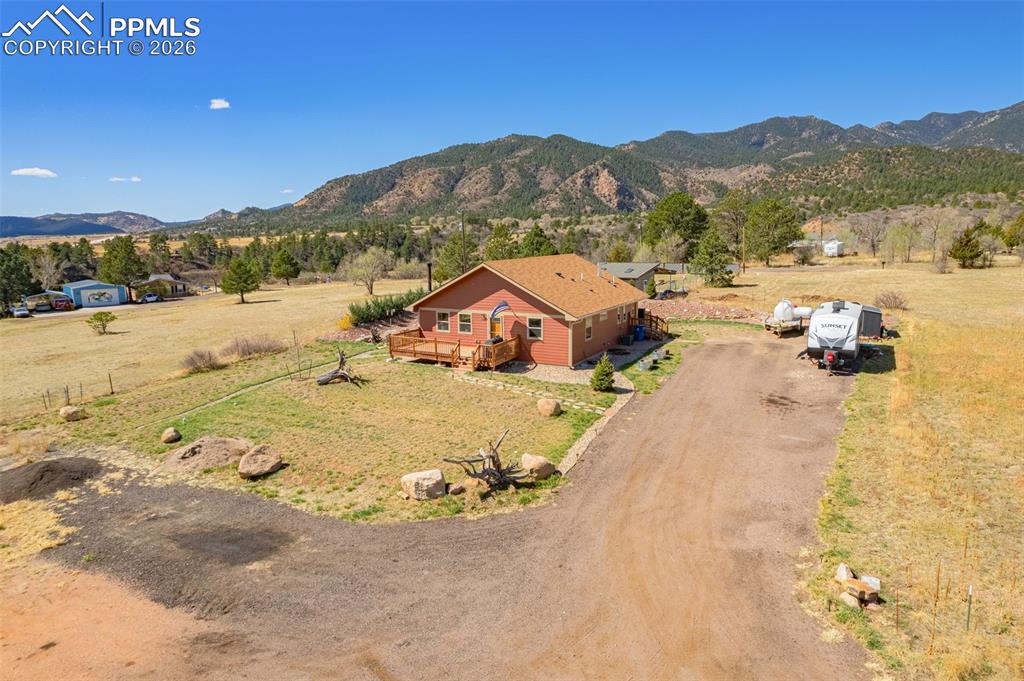8480 Delaware Road Colorado Springs, CO 80926 - Photo 38 of 49 View of rural area featuring a mountainous background