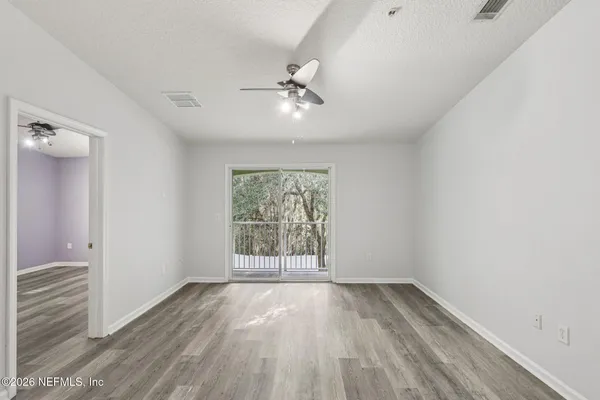 an empty room with windows