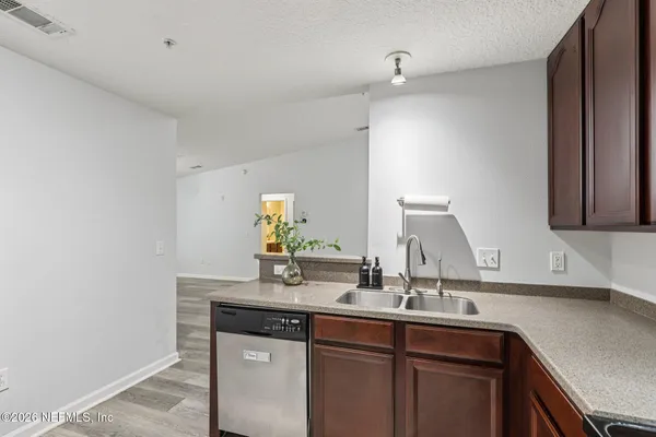 a house with swimming pool in front of it