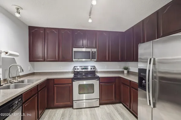 a picture of a bench in a white wall