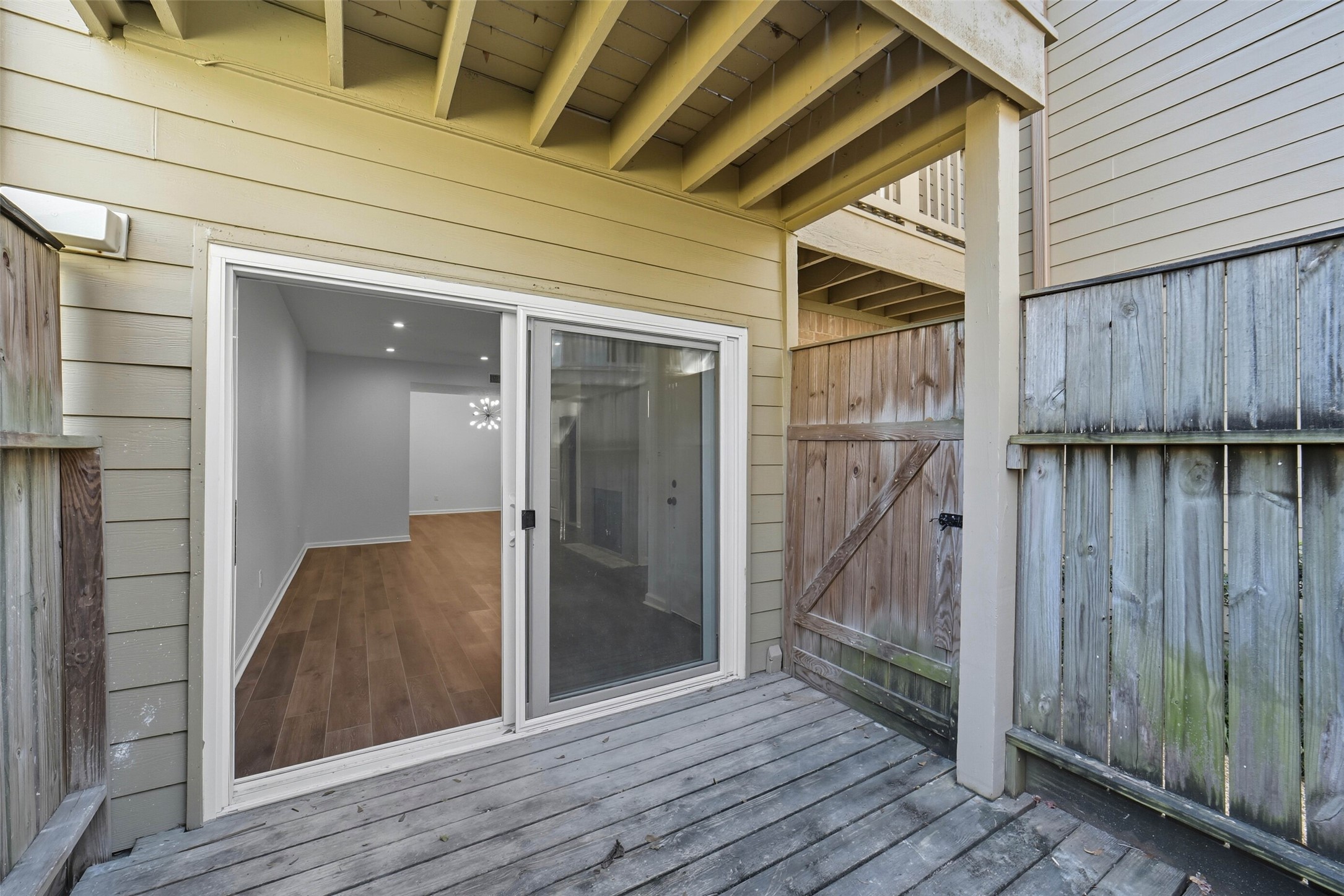 2100 Tanglewilde Street, Unit 625 Houston, TX 77063 - Photo 21 of 23 a view of a wooden door and a hallway