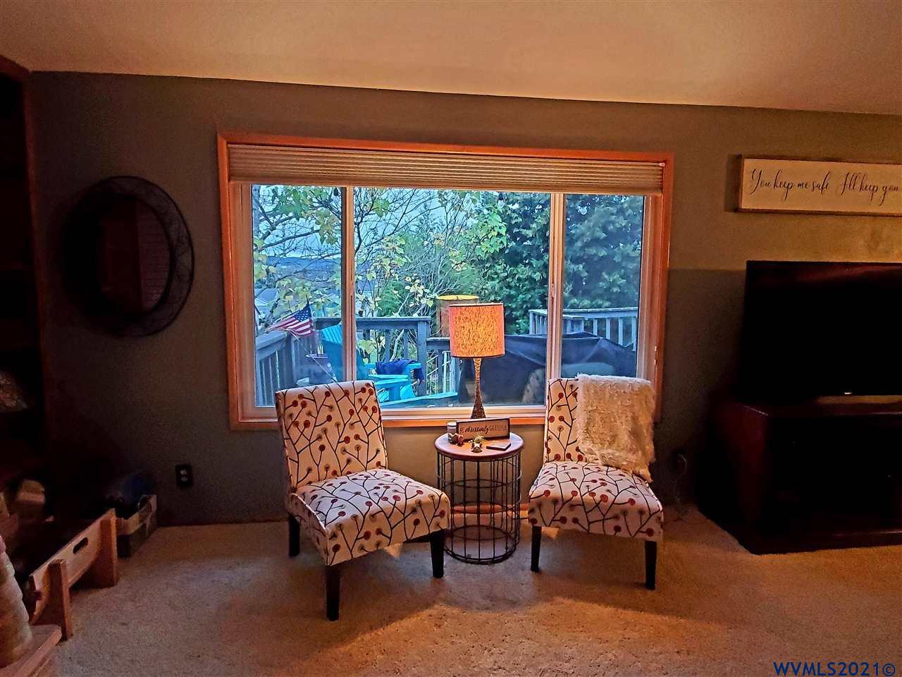 231 Northwest Reed Lane Dallas, OR 97338 - Photo 15 of 41 a outdoor living space with furniture and a window