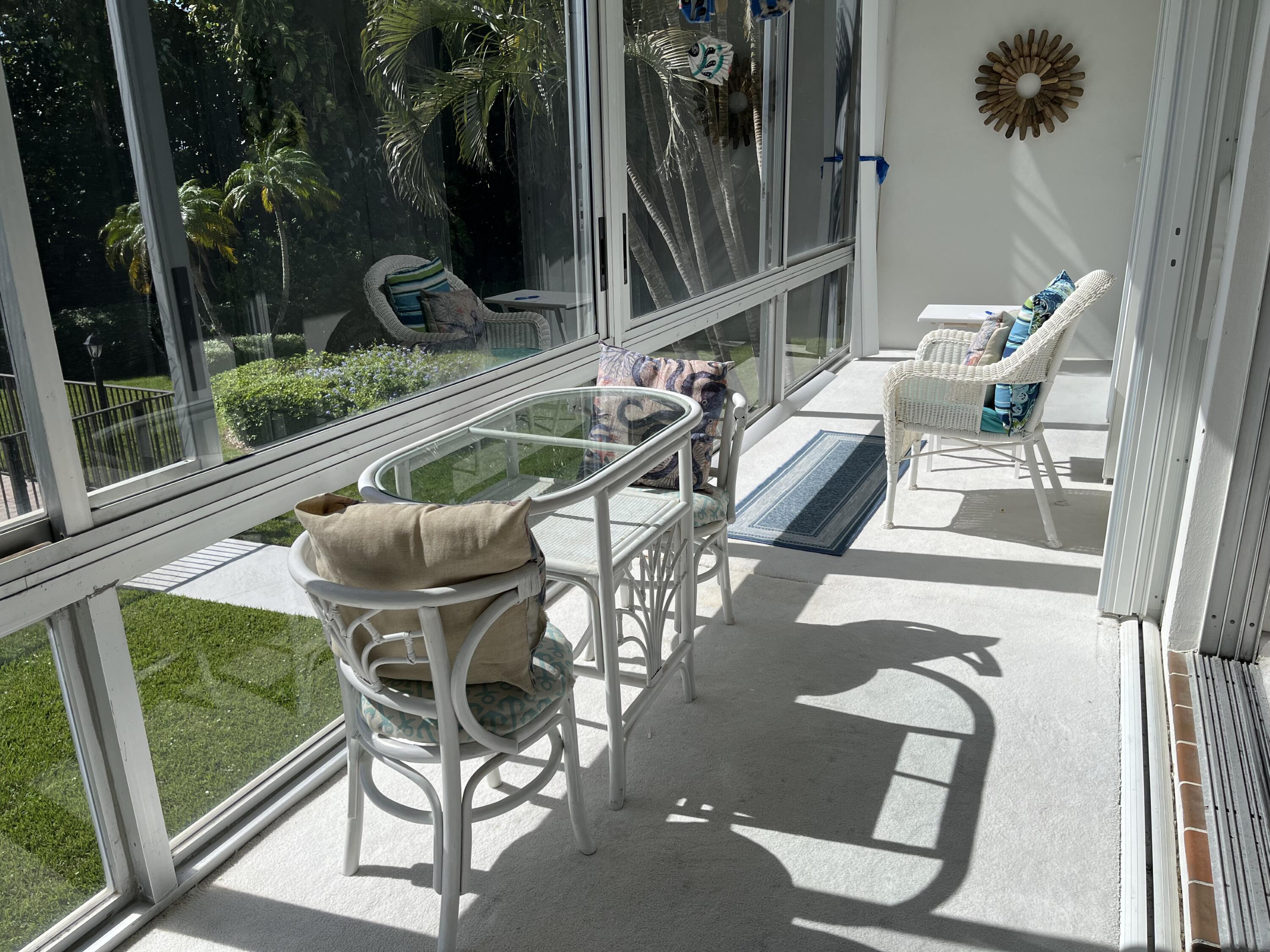 50 Celestial Way, Unit 207 Juno Beach, FL 33408 - Photo 13 of 30 a view of an outdoor seating area