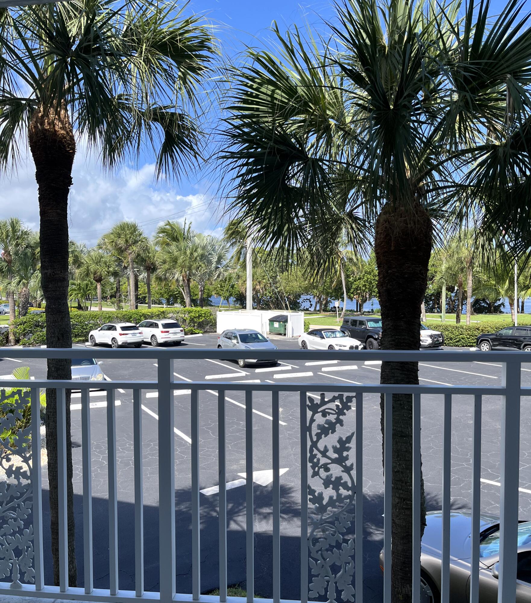 50 Celestial Way, Unit 207 Juno Beach, FL 33408 - Photo 18 of 30 a view of balcony with a garden and trees