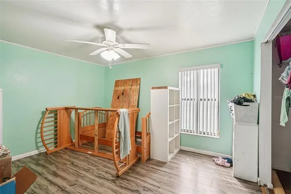 a view of entryway with wooden floor