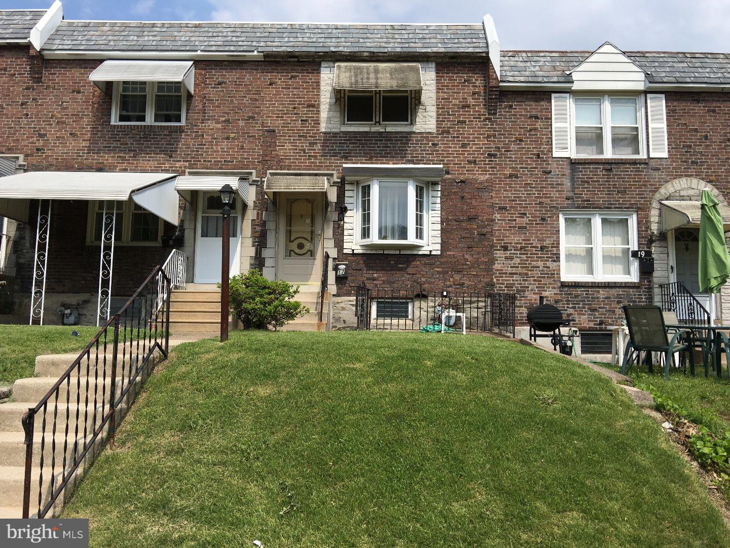 17 Southridge Road Darby, PA 19023 - Photo 3 of 21 a front view of a house with garden