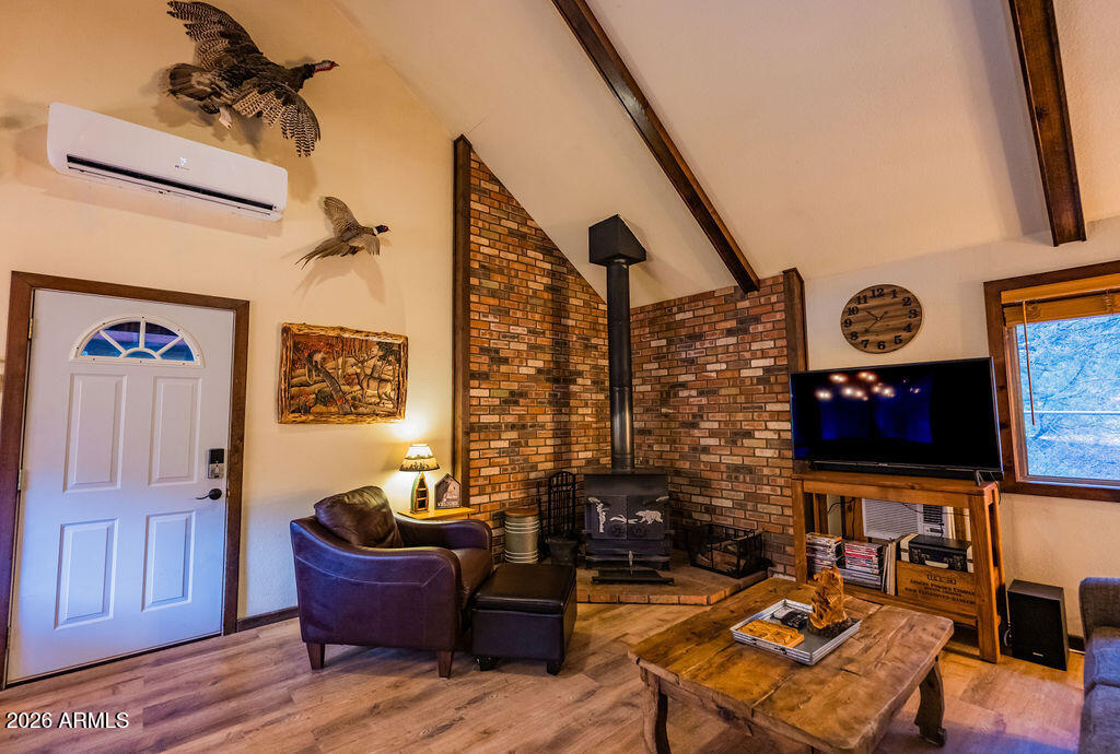 838 Palomino Way Payson, AZ 85541 - Photo 15 of 87 a living room with furniture and a fireplace