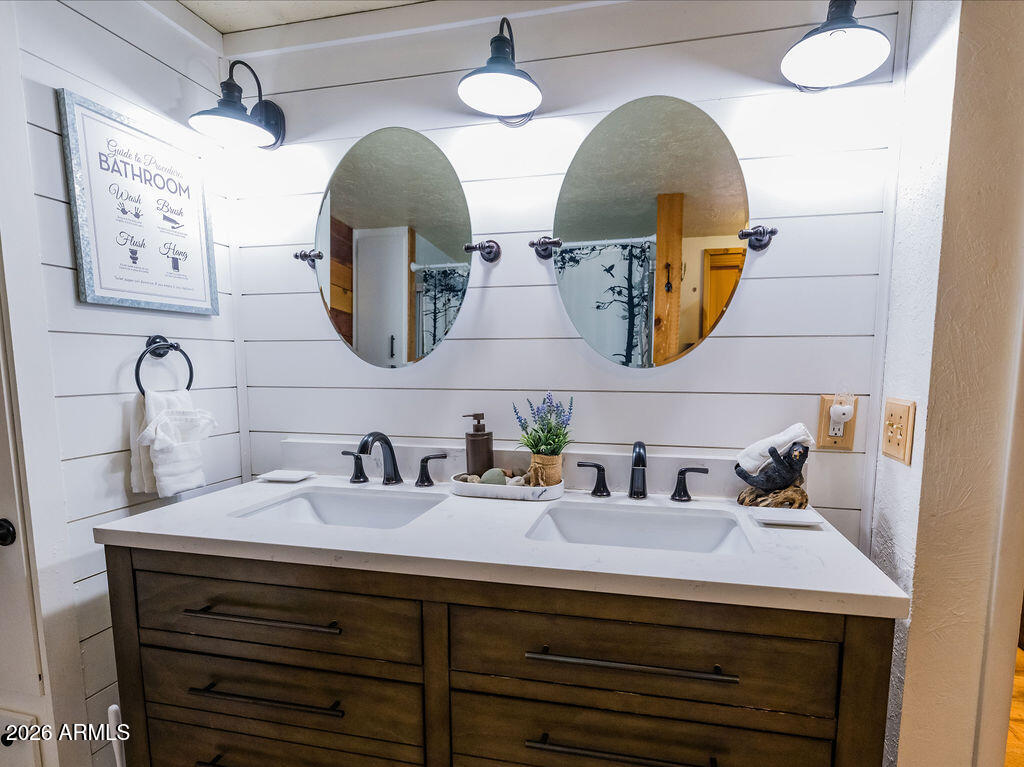838 Palomino Way Payson, AZ 85541 - Photo 53 of 87 a bathroom with a sink and mirror