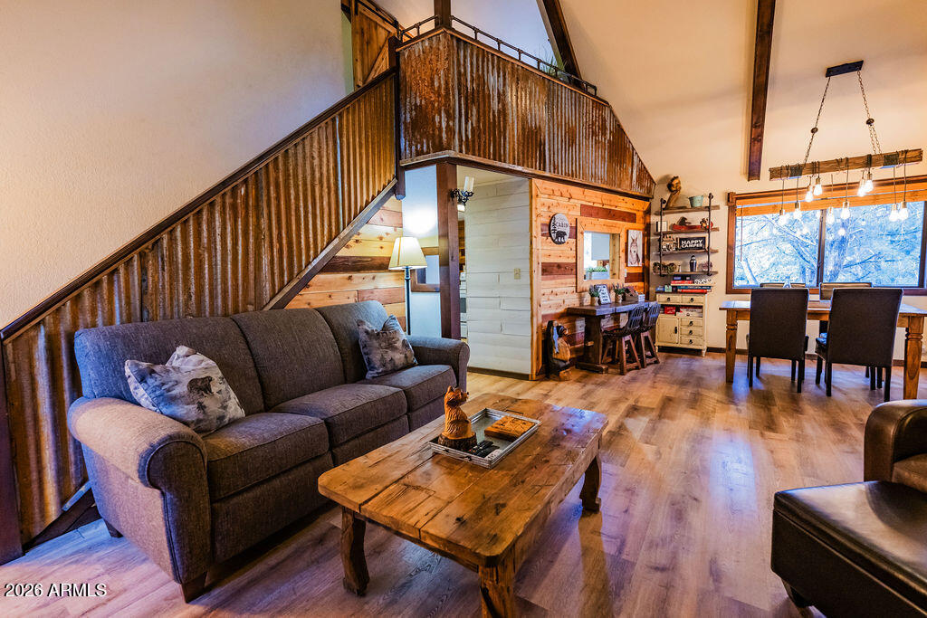 838 Palomino Way Payson, AZ 85541 - Photo 57 of 87 a living room with furniture a wooden floor and next to a window