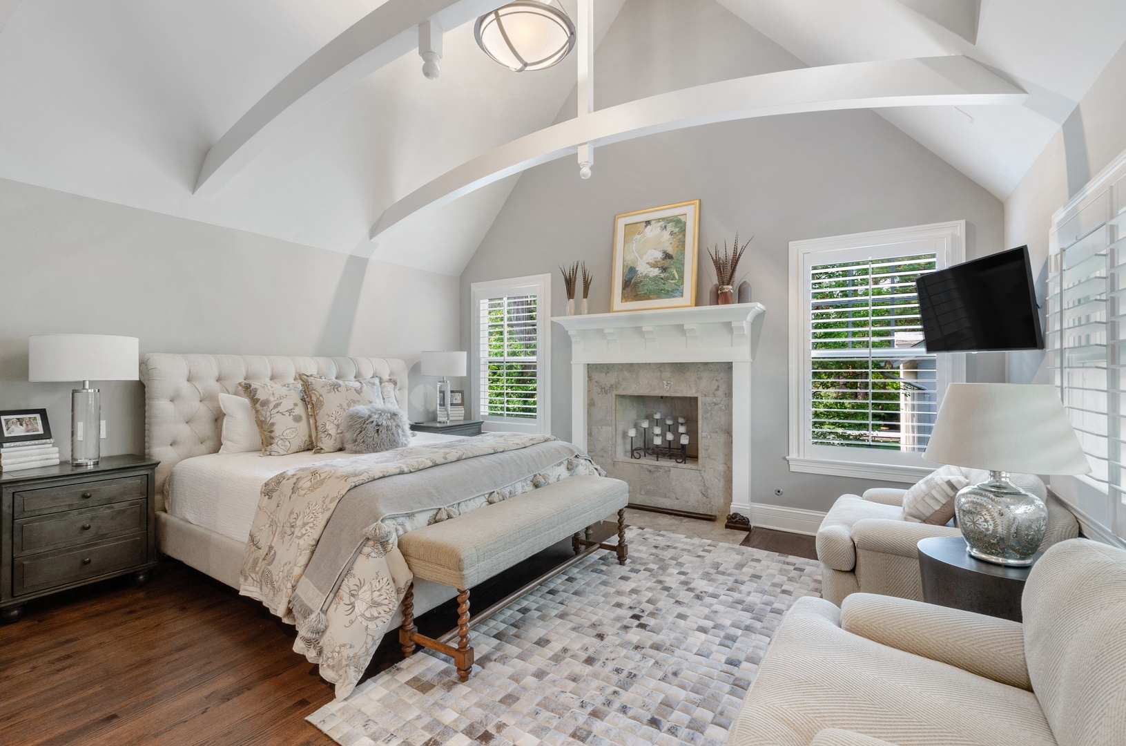 672 Elder Lane Winnetka, IL 60093 - Photo 19 of 32 a spacious bedroom with a bed and a fireplace