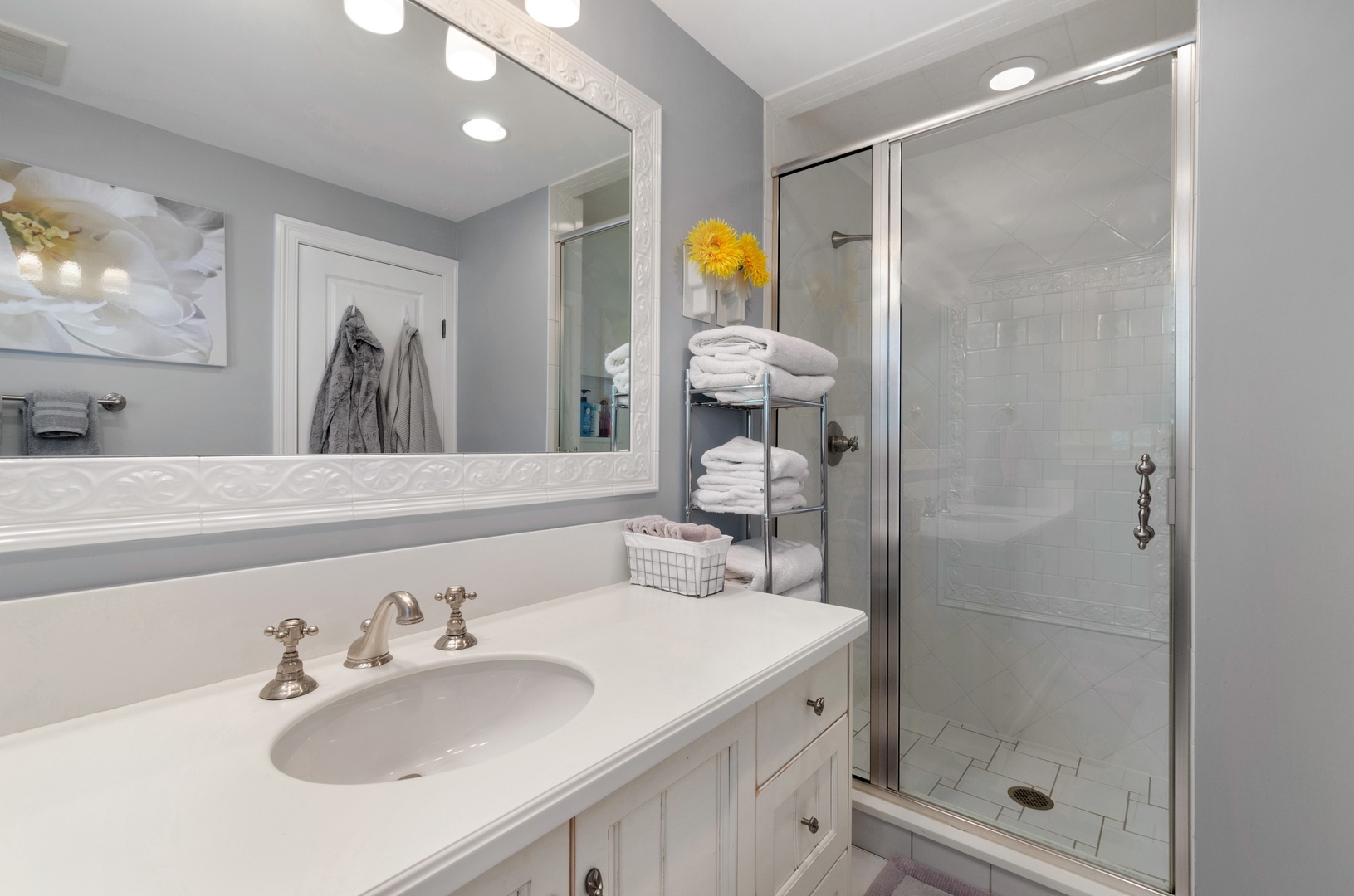 672 Elder Lane Winnetka, IL 60093 - Photo 23 of 32 a bathroom with a sink a toilet and shower