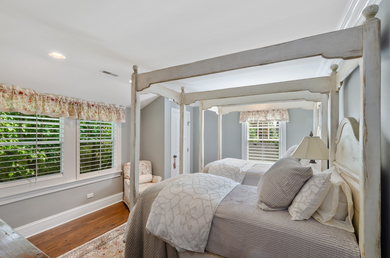 672 Elder Lane Winnetka, IL 60093 - Photo 24 of 32 a bedroom with a bed and a large window