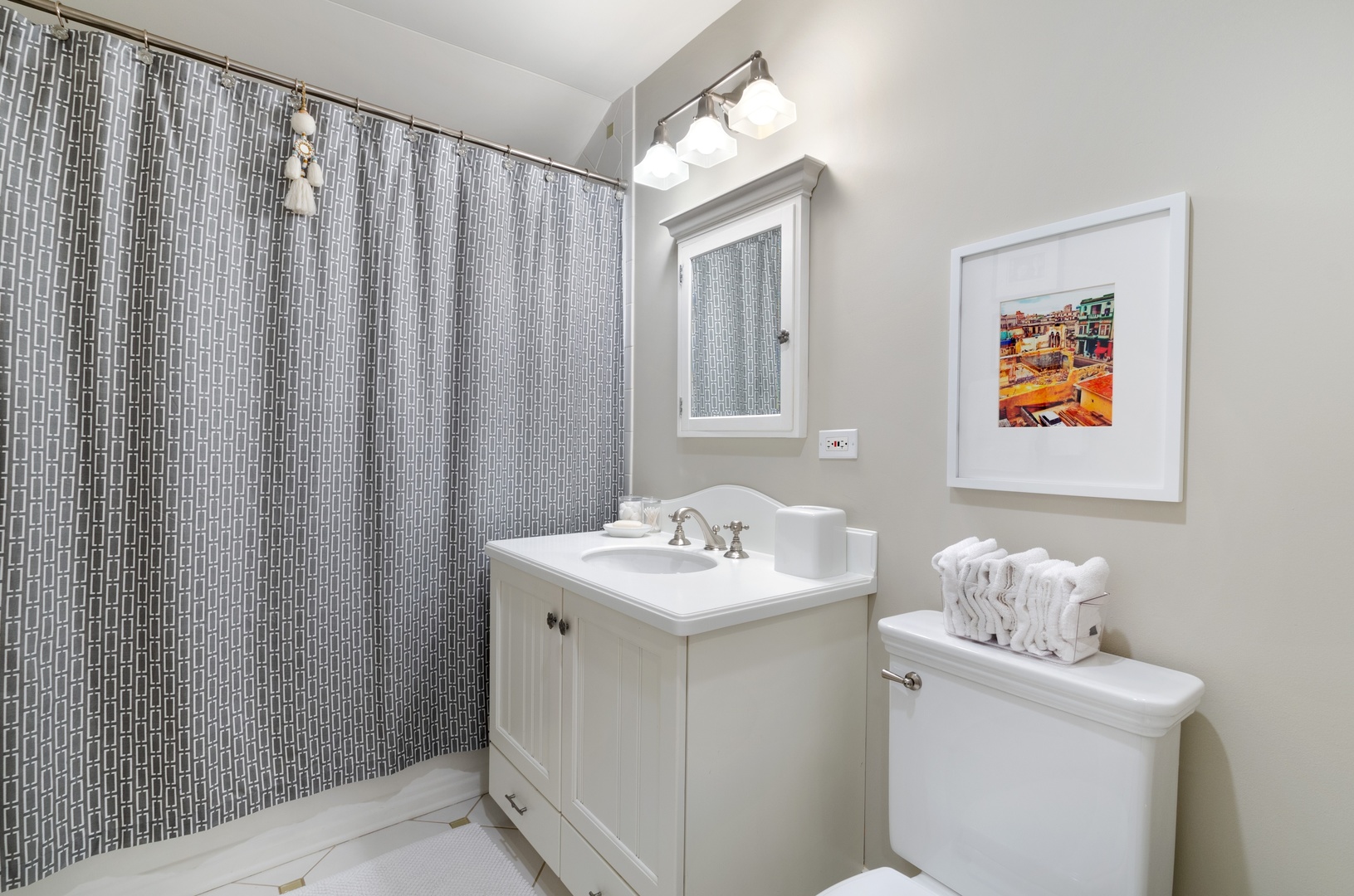 672 Elder Lane Winnetka, IL 60093 - Photo 25 of 32 a bathroom with a sink toilet and vanity