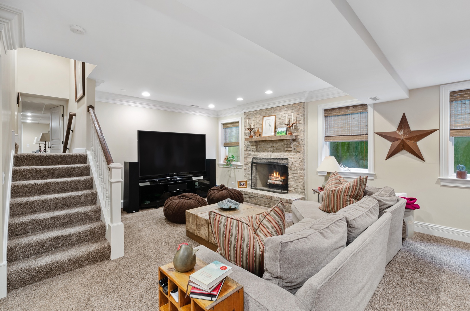 672 Elder Lane Winnetka, IL 60093 - Photo 27 of 32 a living room with furniture and a flat screen tv