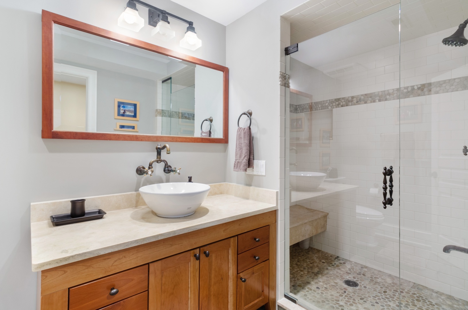 672 Elder Lane Winnetka, IL 60093 - Photo 29 of 32 a bathroom with a sink and a mirror