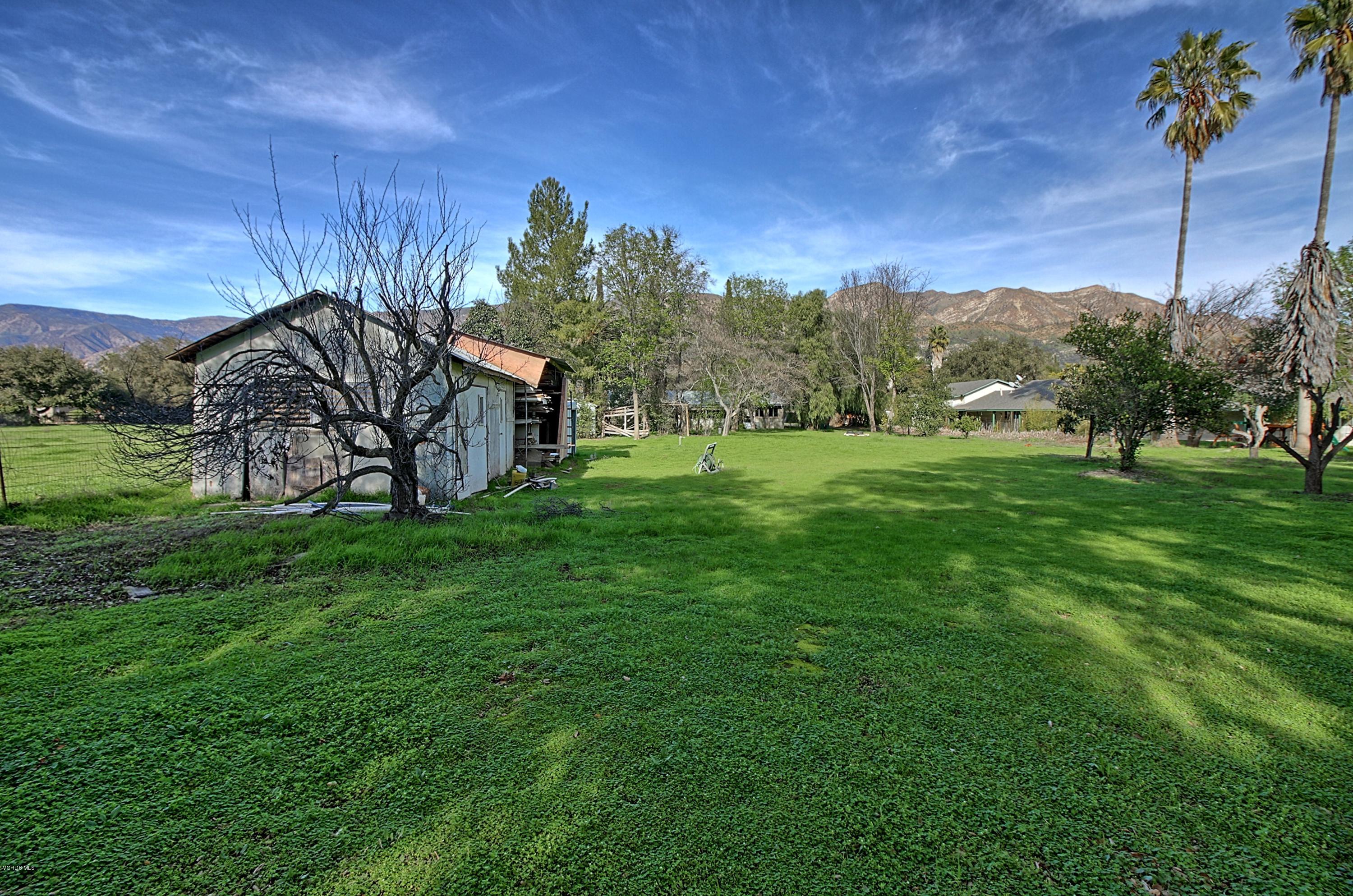 950 Fairview Road Ojai, CA 93023 - Photo 14 of 21 a view of a garden with a house in the background