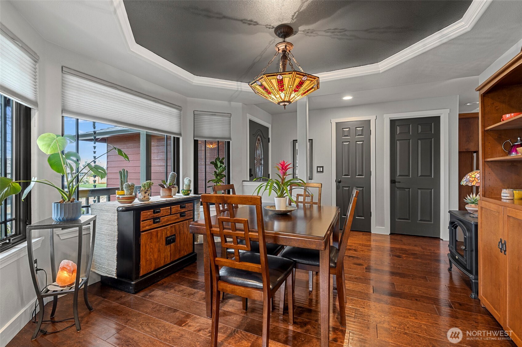 108 South 28th Street Mount Vernon, WA 98274 - Photo 11 of 40 a view of a dining room with furniture a chandelier and wooden floor