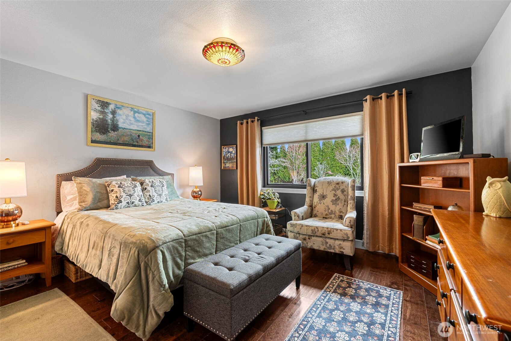 108 South 28th Street Mount Vernon, WA 98274 - Photo 17 of 40 a bedroom with a bed and a couch