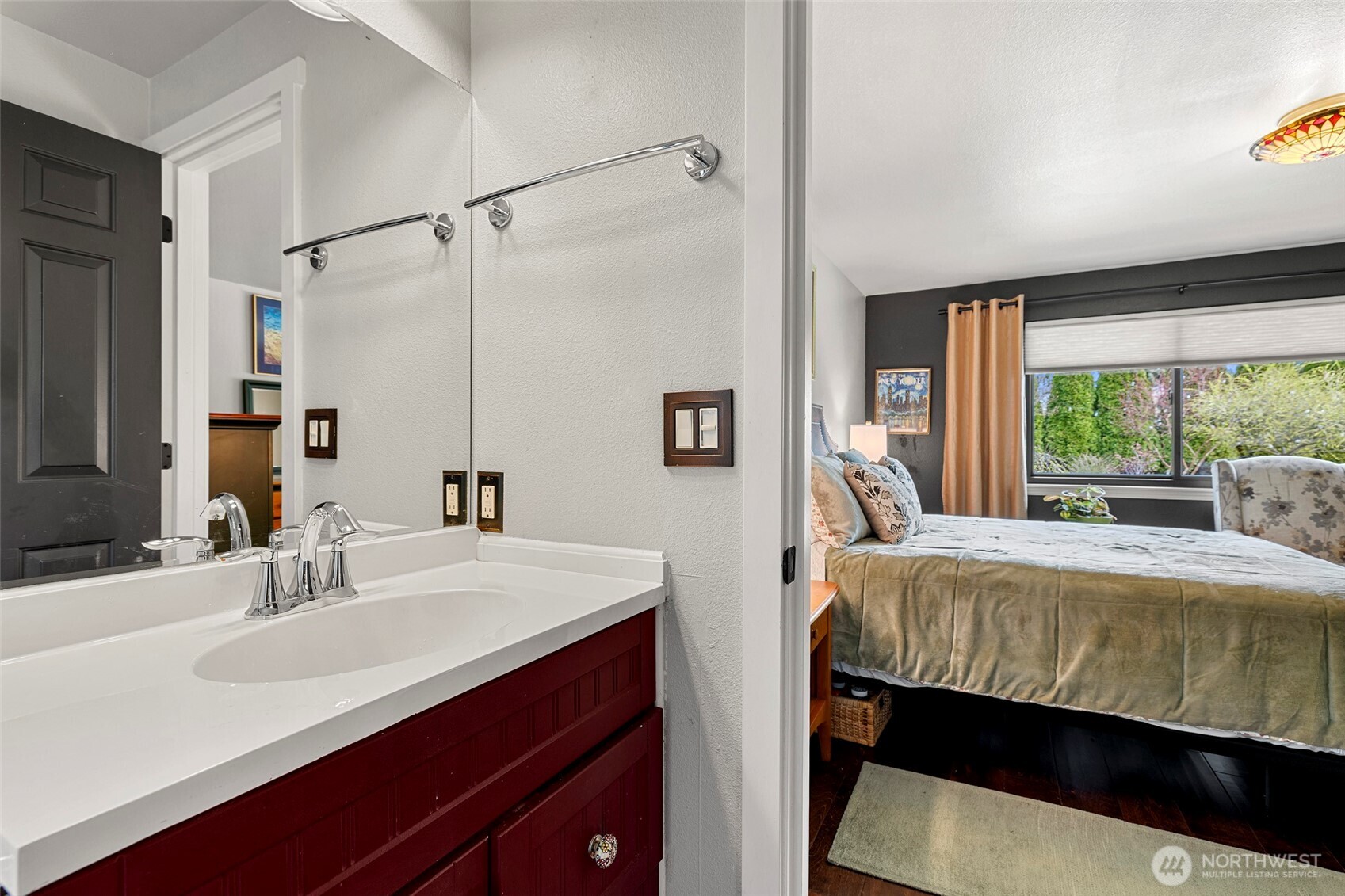 108 South 28th Street Mount Vernon, WA 98274 - Photo 19 of 40 a bedroom with a bed and a sink