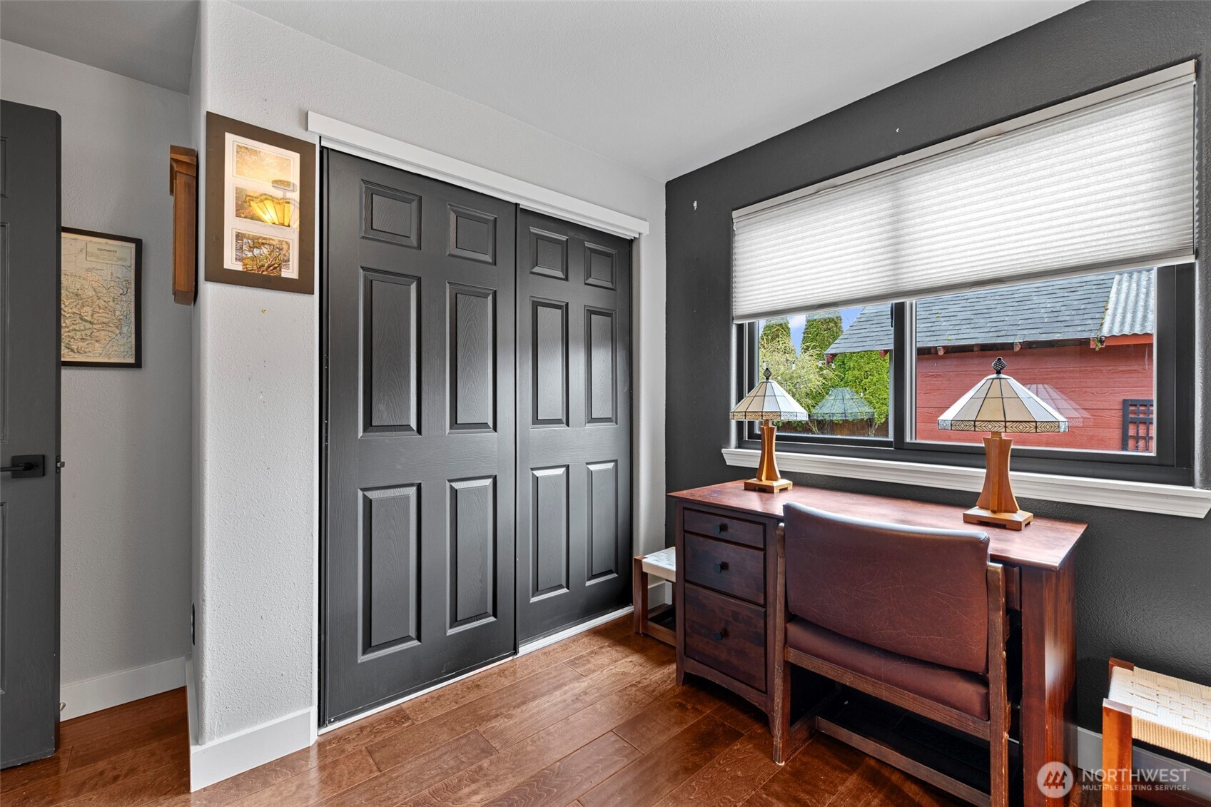 108 South 28th Street Mount Vernon, WA 98274 - Photo 23 of 40 a room with wooden floor and furniture