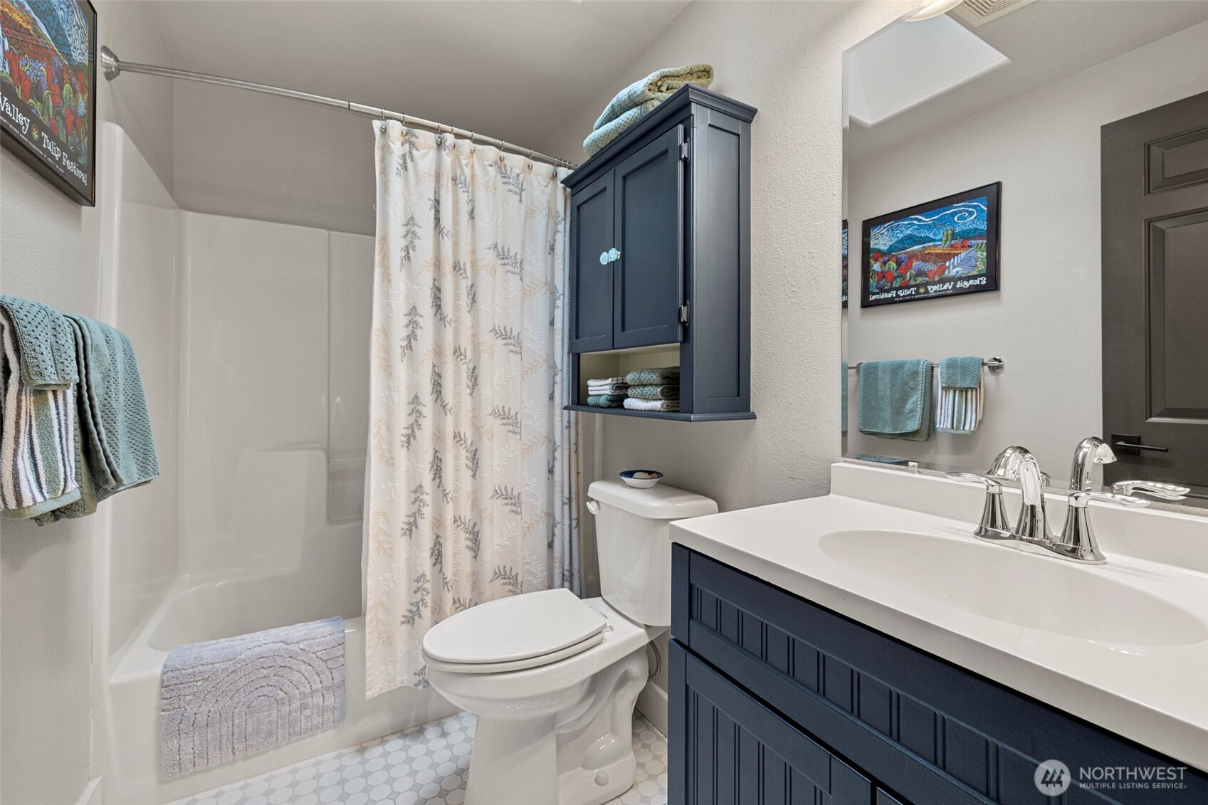 108 South 28th Street Mount Vernon, WA 98274 - Photo 26 of 40 a bathroom with a sink a toilet and shower