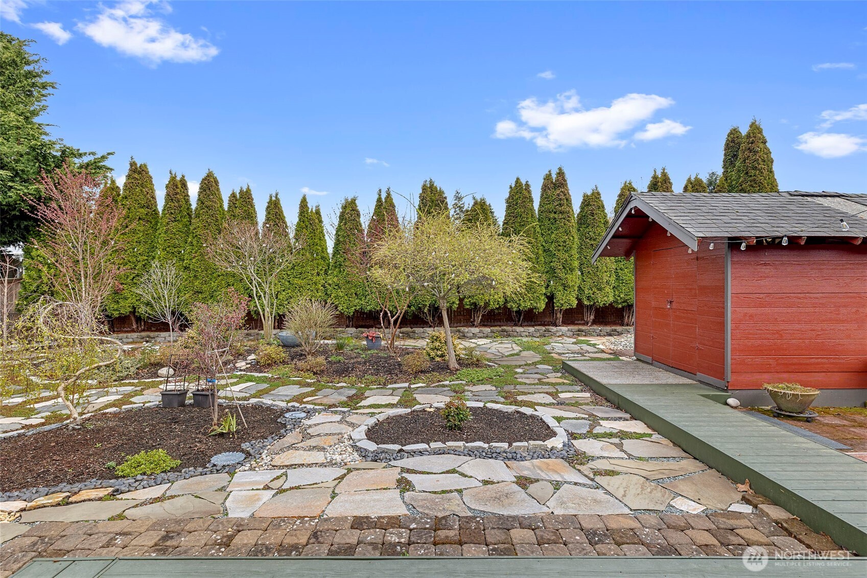108 South 28th Street Mount Vernon, WA 98274 - Photo 32 of 40 a view of a yard with an tree