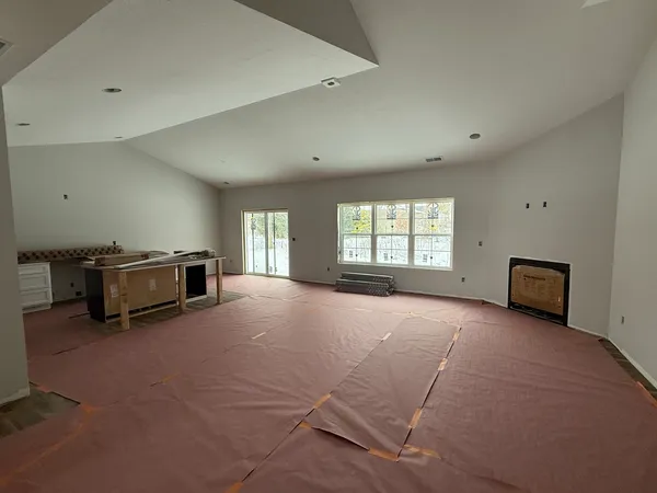 a view of a livingroom with furniture