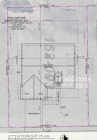 a kitchen with a stove a refrigerator and a sink