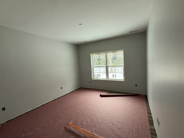 a view of a bathroom with a sink and shower