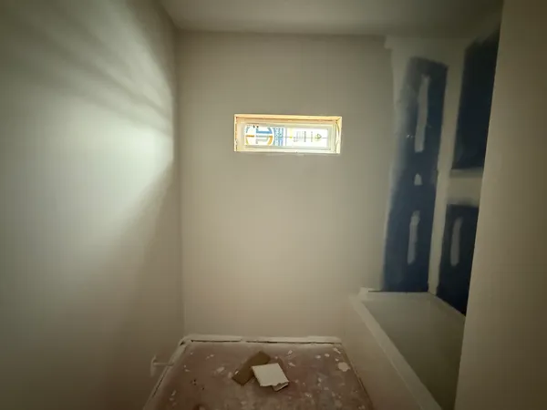 an empty room with windows