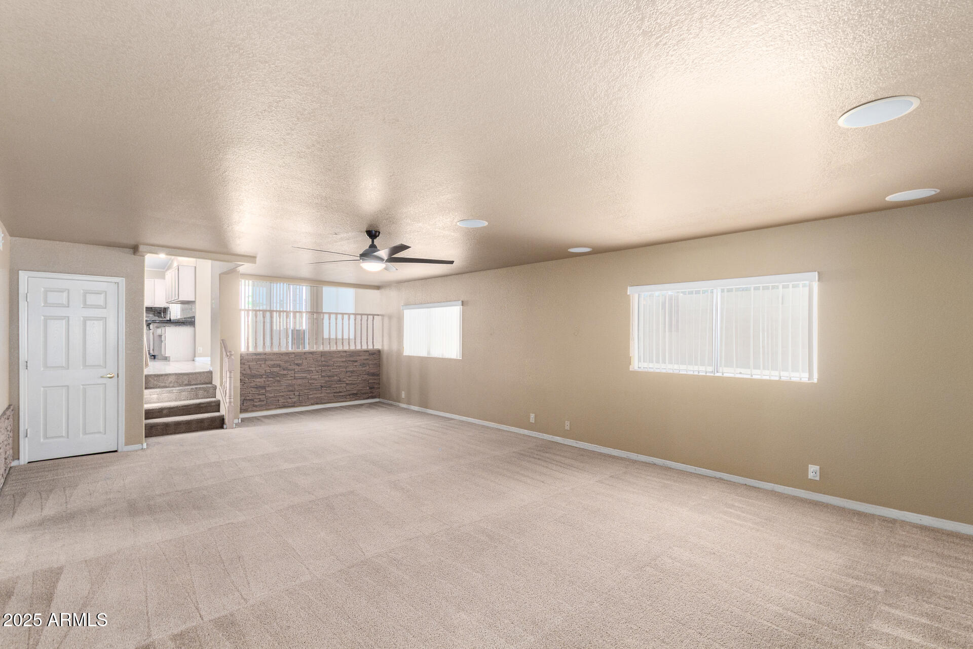 8733 West Wethersfield Road Peoria, AZ 85381 - Photo 4 of 43 Huge Family room - Tri level