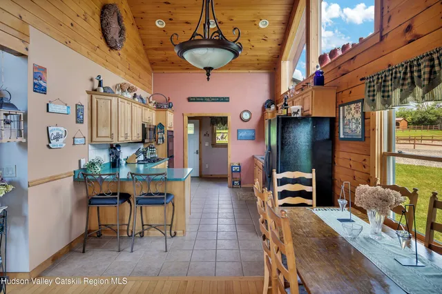 a kitchen with a sink cabinets and window