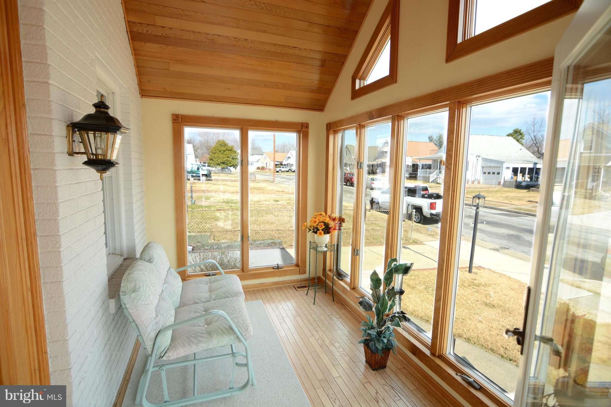 2618 Ambler Road Baltimore, MD 21222 - Photo 5 of 30 a view of a room with wooden floor and windows