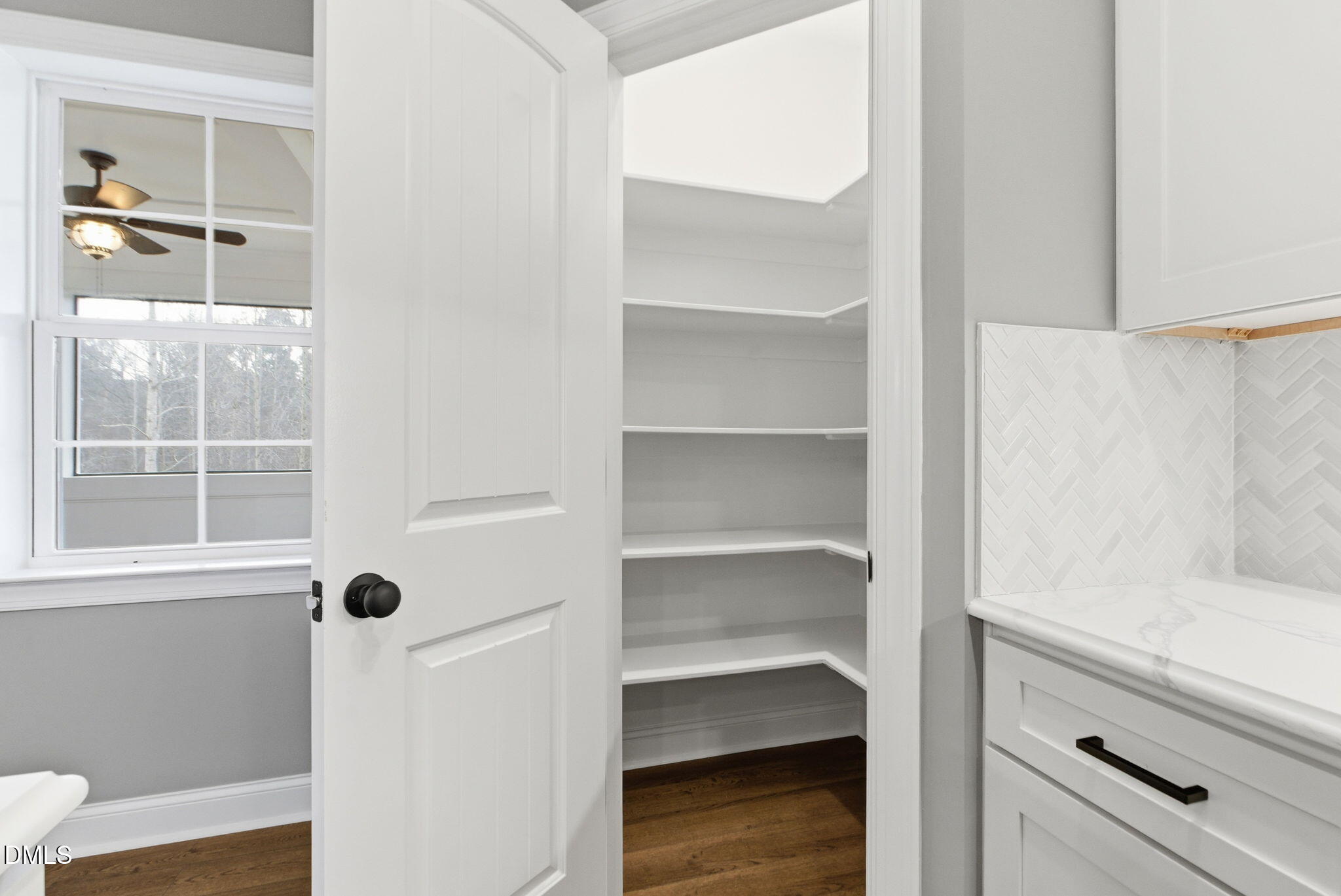 3649 Saxapahaw-Bethlehem Church Road Mebane, NC 27302 - Photo 22 of 69 a view of walk in closet with empty racks