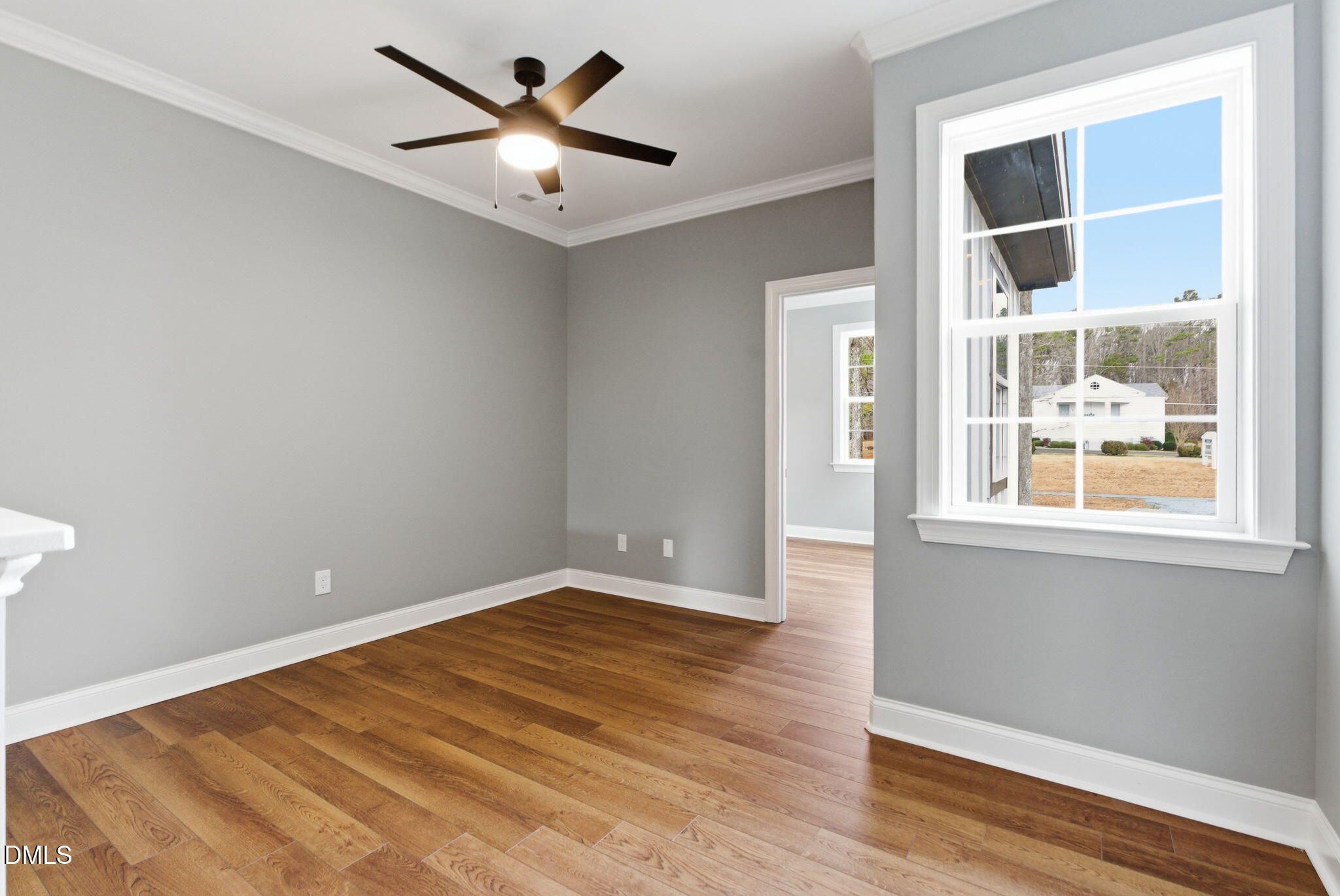 3649 Saxapahaw-Bethlehem Church Road Mebane, NC 27302 - Photo 29 of 69 an empty room with wooden floor and windows