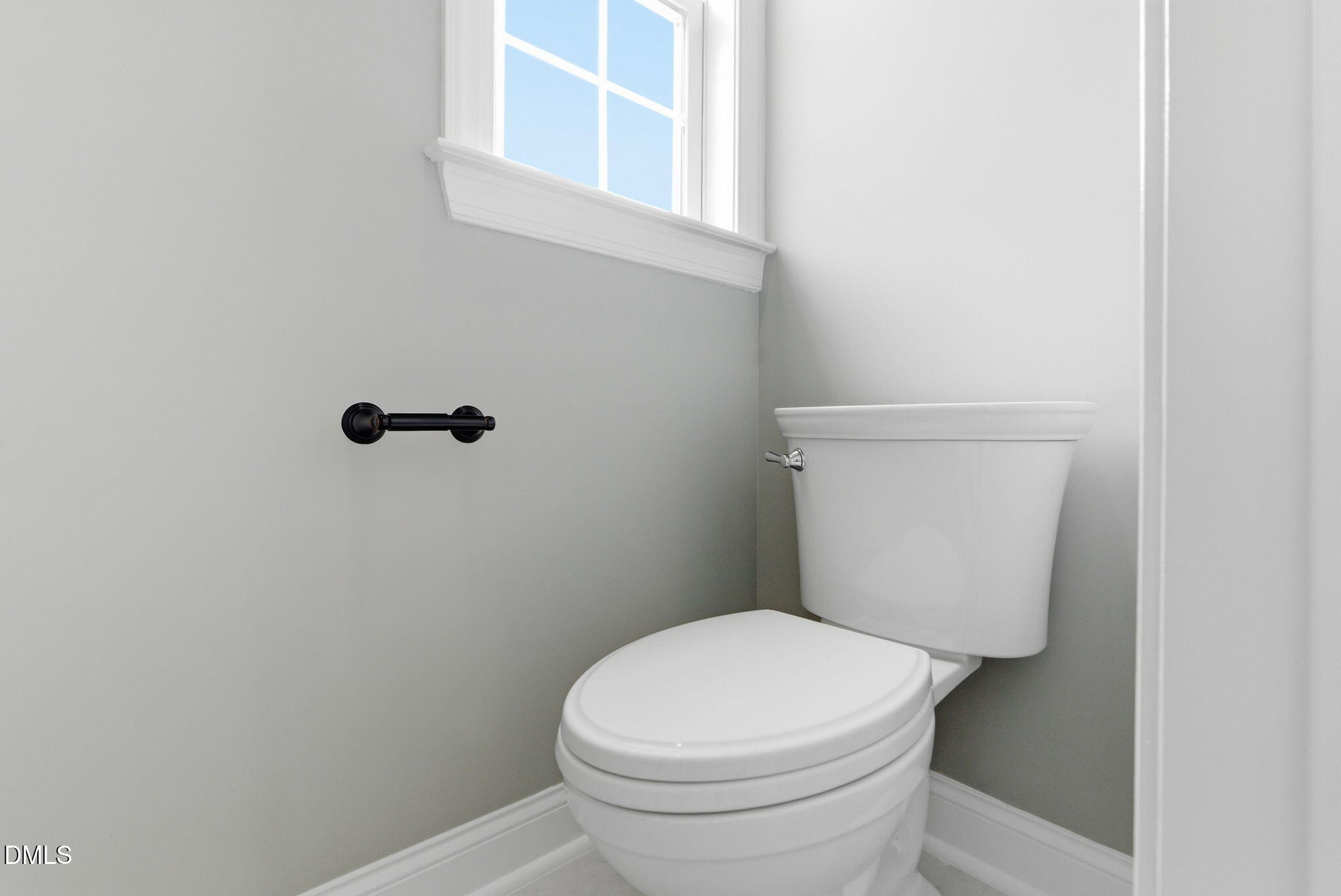 3649 Saxapahaw-Bethlehem Church Road Mebane, NC 27302 - Photo 39 of 69 a white toilet sitting next to a window