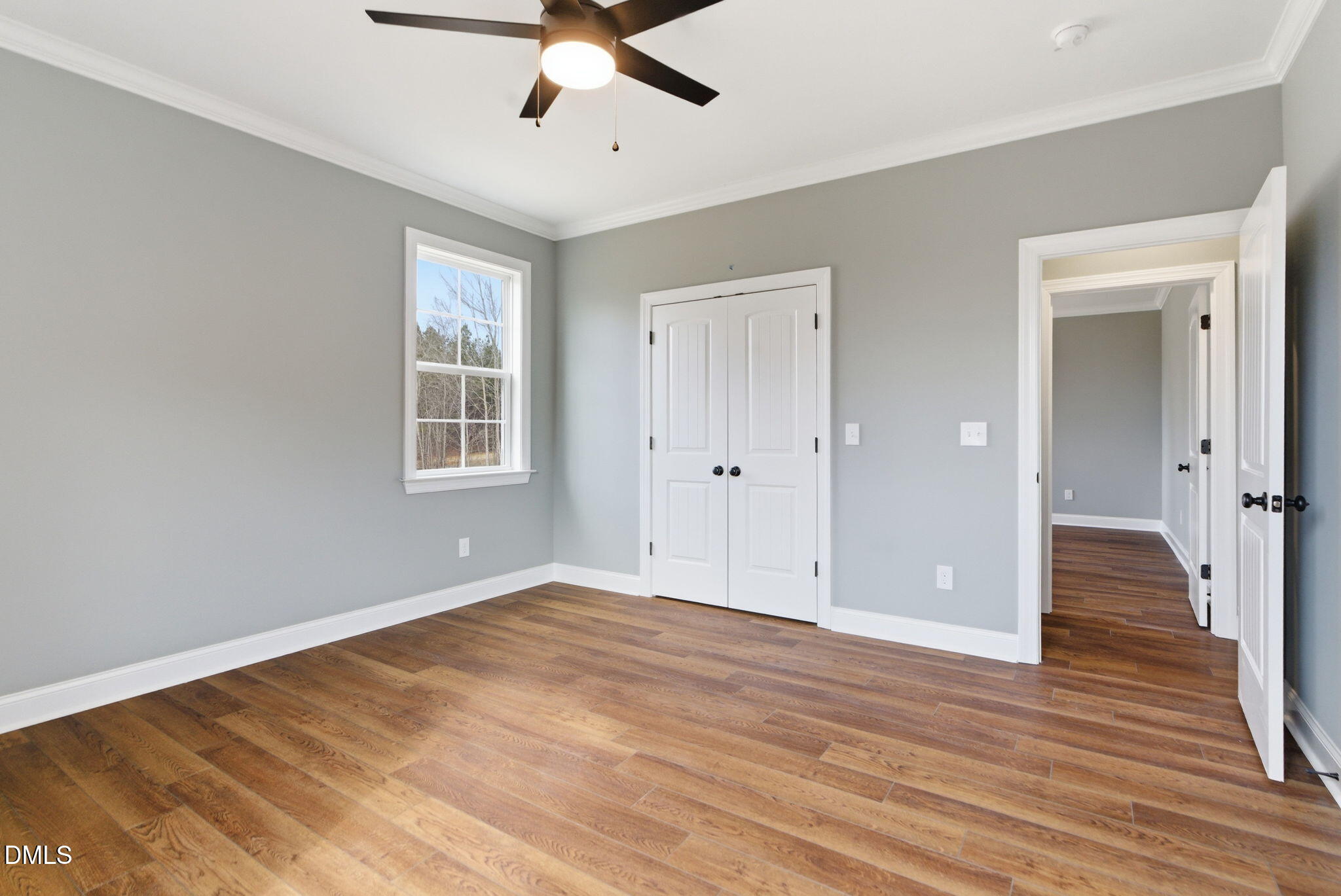 3649 Saxapahaw-Bethlehem Church Road Mebane, NC 27302 - Photo 45 of 69 a view of an empty room with wooden floor and a window