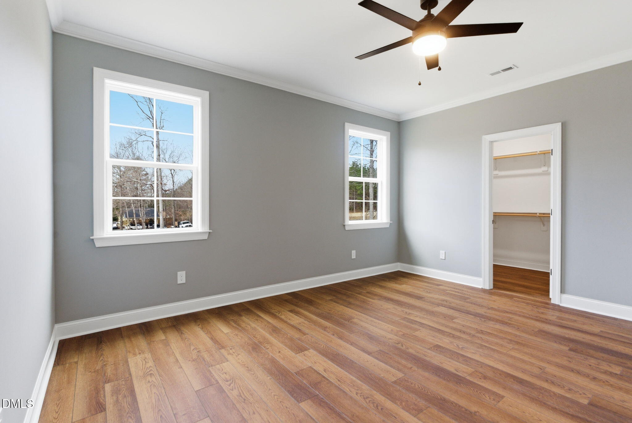 3649 Saxapahaw-Bethlehem Church Road Mebane, NC 27302 - Photo 47 of 69 a view of an empty room with wooden floor and a window