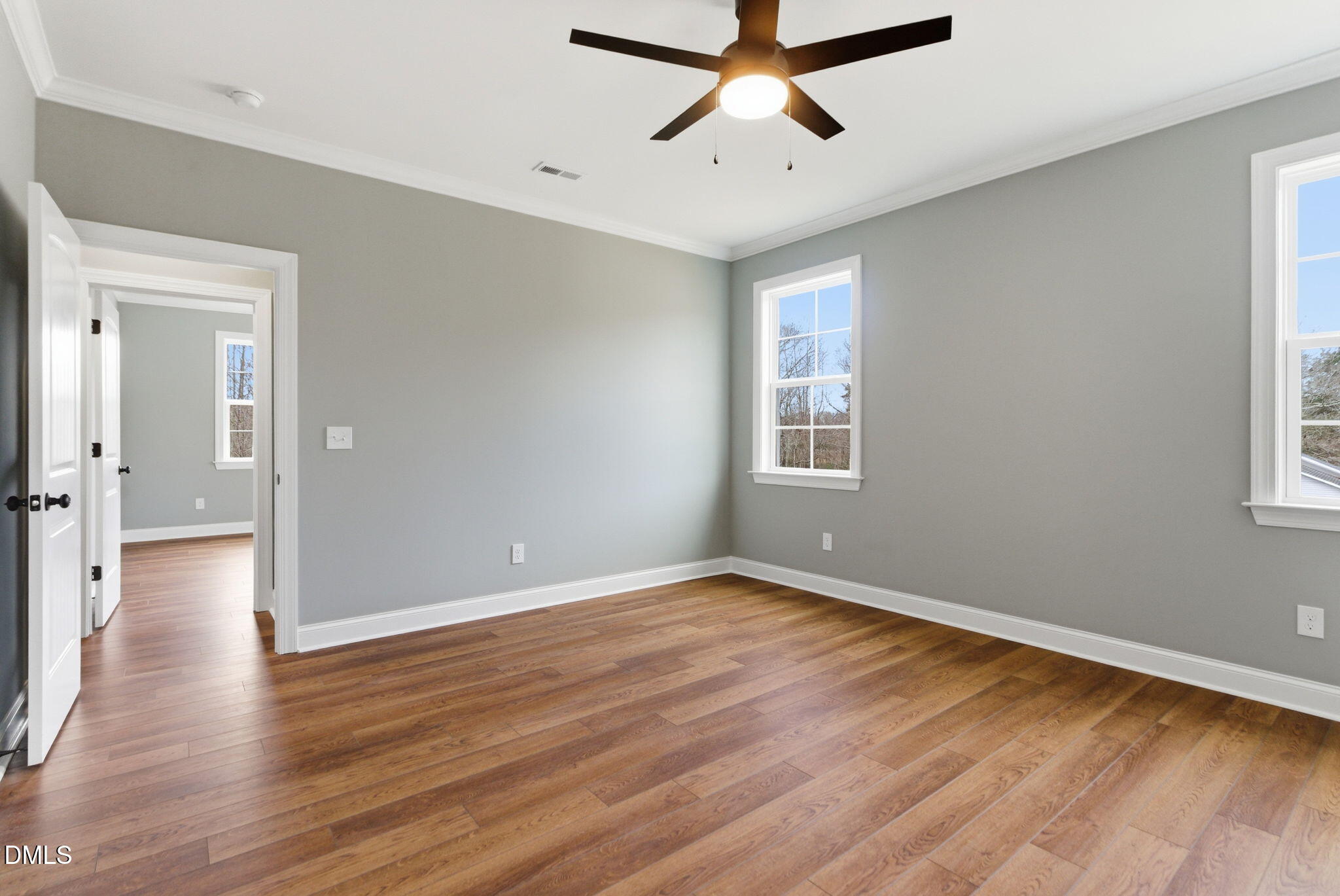 3649 Saxapahaw-Bethlehem Church Road Mebane, NC 27302 - Photo 49 of 69 an empty room with wooden floor and windows