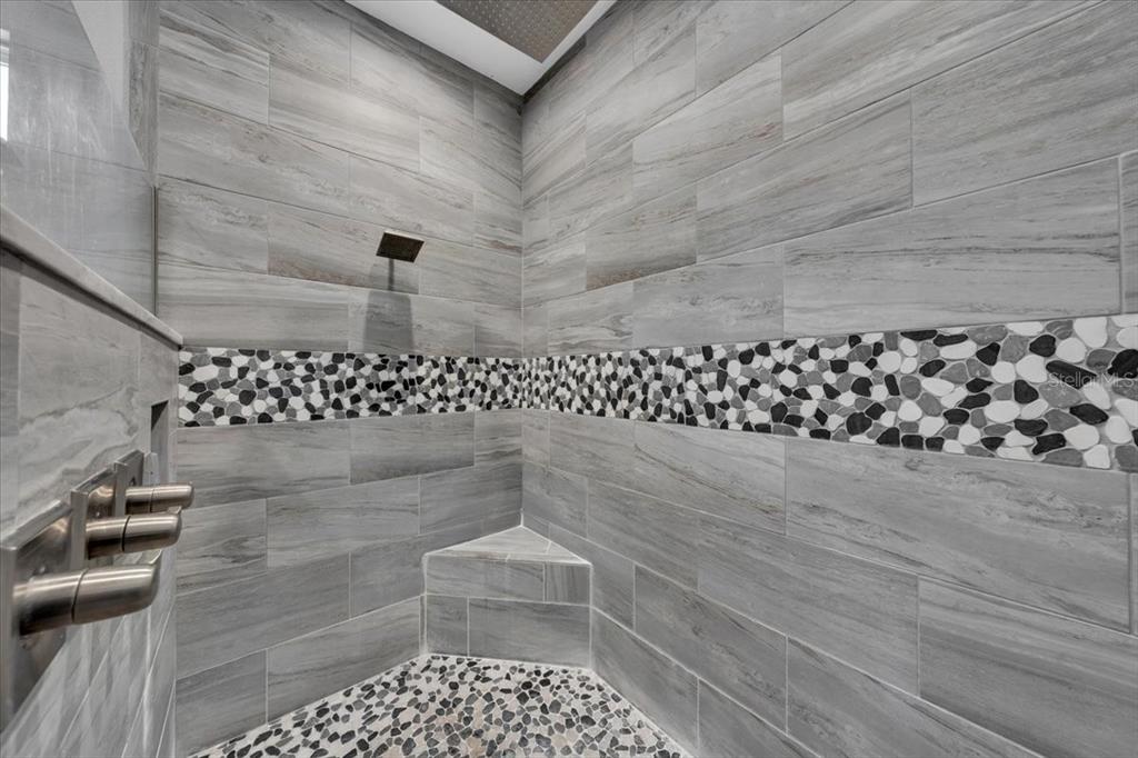 8011 Revels Road Riverview, FL 33569 - Photo 19 of 38 a bathroom with a shower