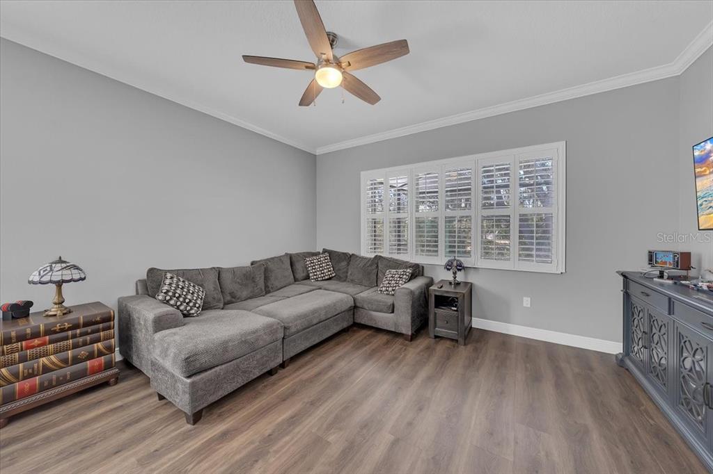 8011 Revels Road Riverview, FL 33569 - Photo 26 of 38 a living room with furniture and a large window
