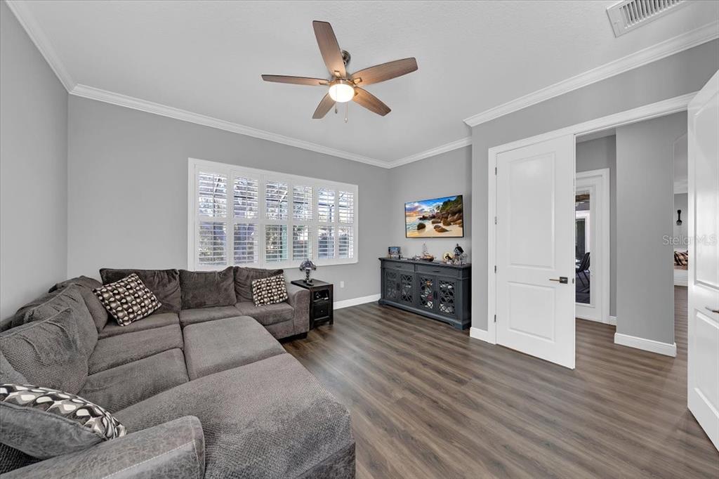 8011 Revels Road Riverview, FL 33569 - Photo 27 of 38 a living room with furniture and a large window