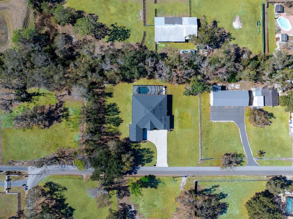 8011 Revels Road Riverview, FL 33569 - Photo 36 of 38 an aerial view of residential house with outdoor space and swimming pool