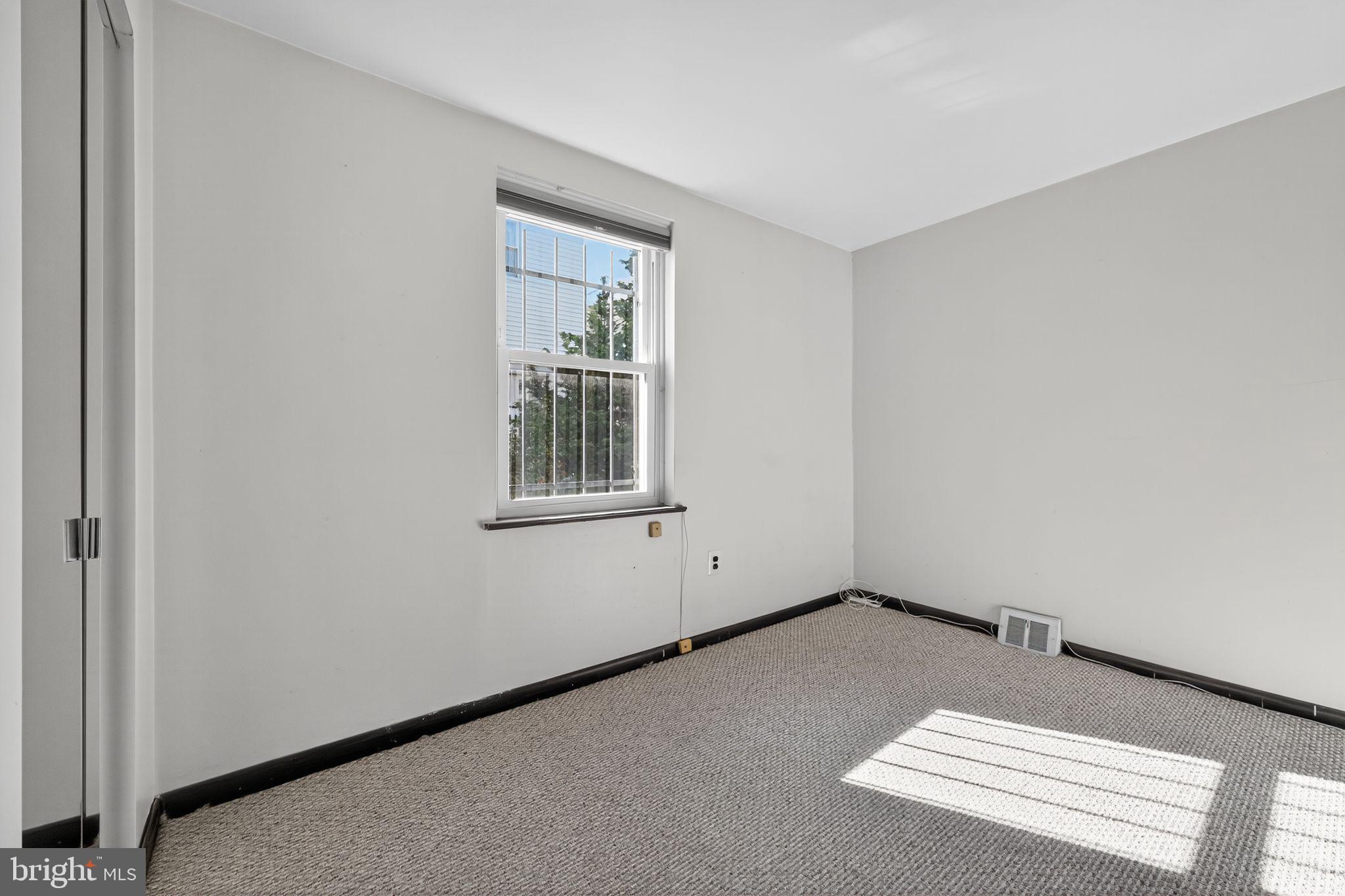 1930 Kater Street Philadelphia, PA 19146 - Photo 17 of 30 an empty room with windows