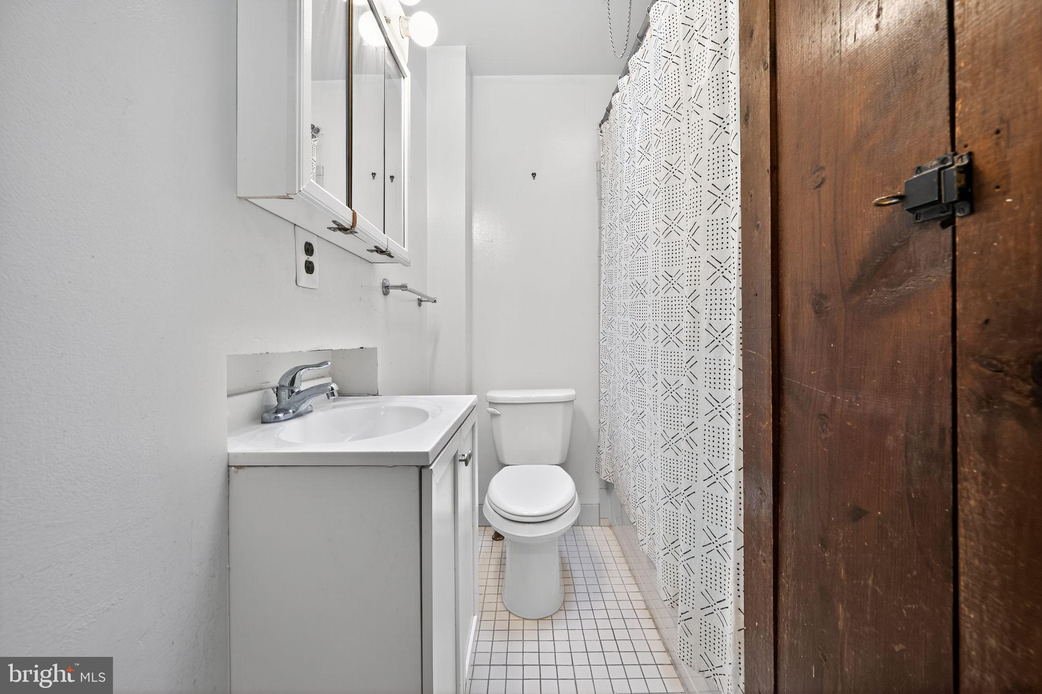 1930 Kater Street Philadelphia, PA 19146 - Photo 25 of 30 a bathroom with a sink toilet and shower
