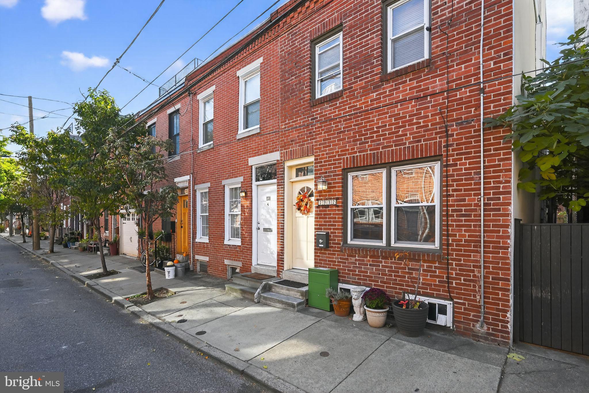 1930 Kater Street Philadelphia, PA 19146 - Photo 4 of 30 a brick building with a large windows