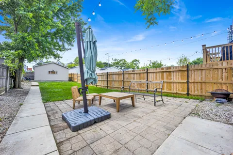 a view of a backyard with a garden