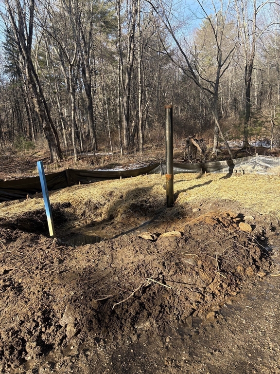 2 Sandersdale Road Charlton, MA 01507 - Photo 2 of 3 a view of a backyard with wooden fence